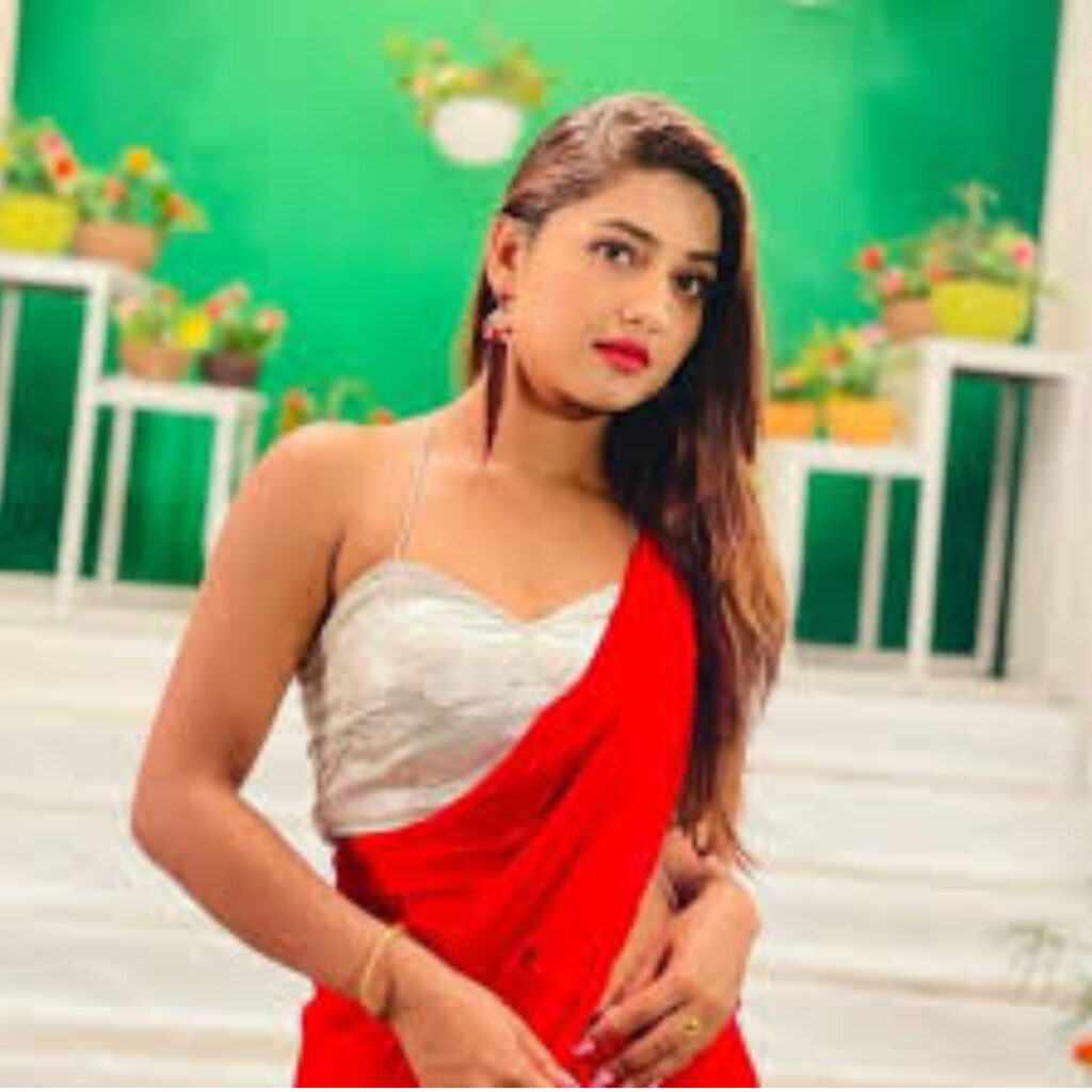 A GIRL 24 YEARS OLD IN RED AND WHITE DRESS IN SEXY WAY GIVING POSE